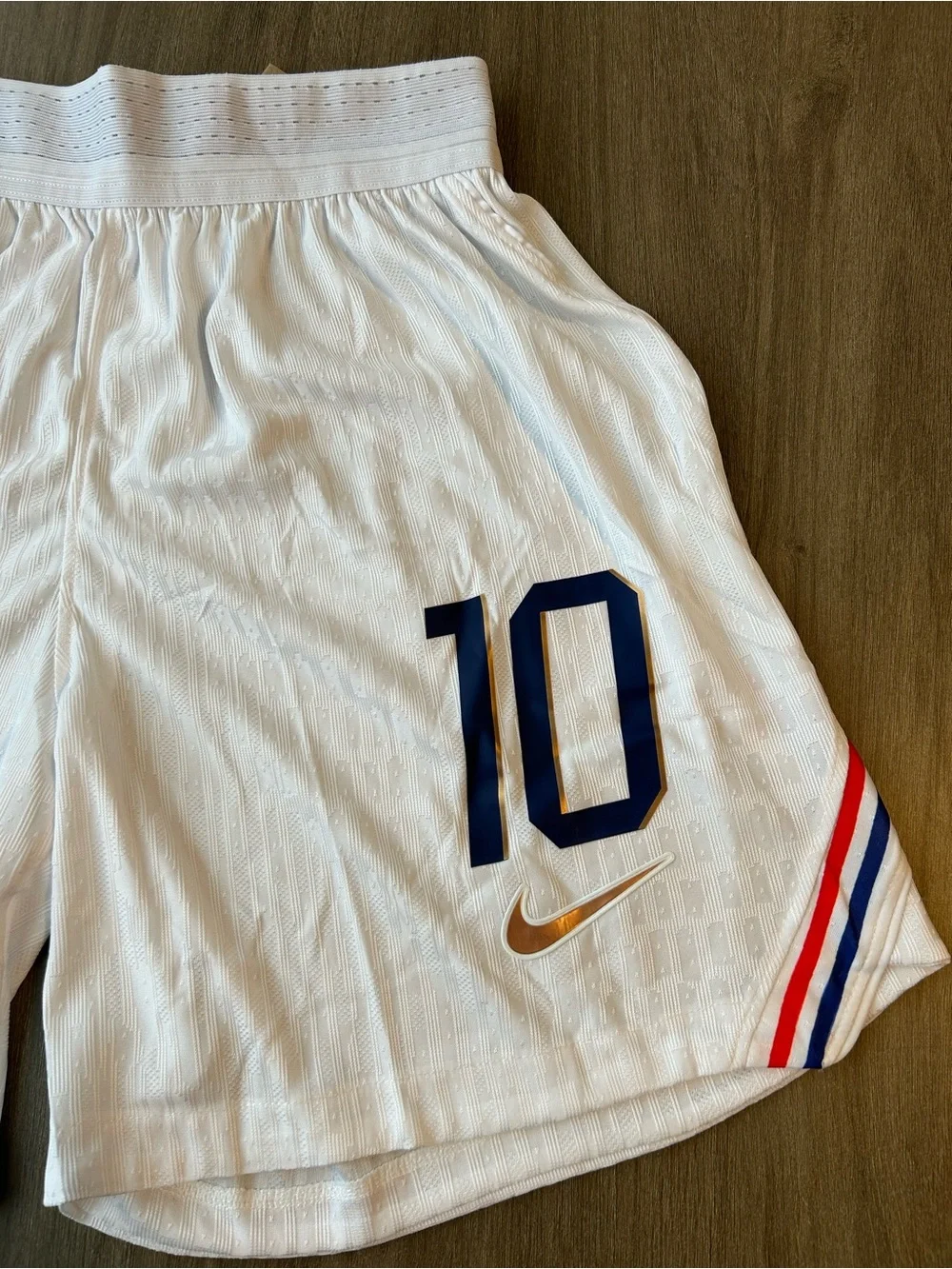 Nike Men’s White Soccer Shorts with Navy and Gold Accents (No. 10)
